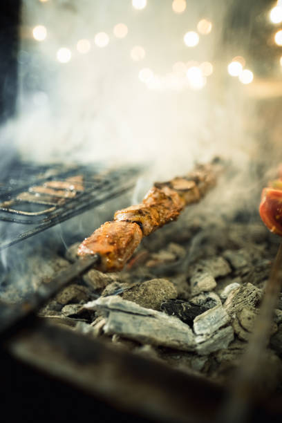 Cooking Turkish traditional shish kebab on grill