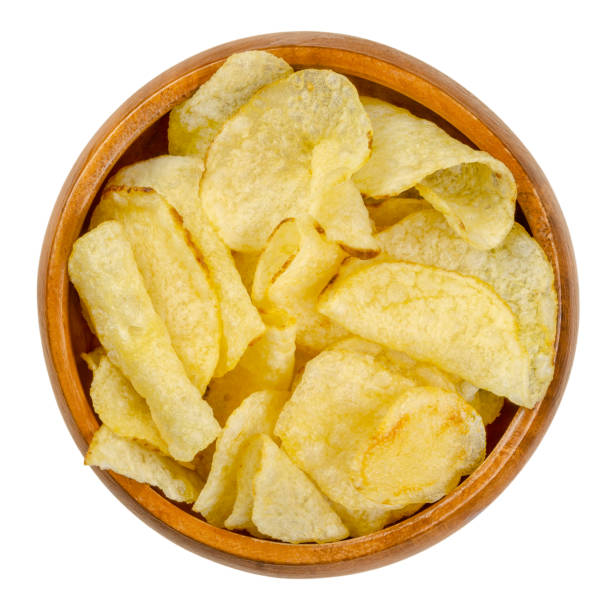 istock Salted potato chips with peel, also crisps, in wooden bowl 1269377503