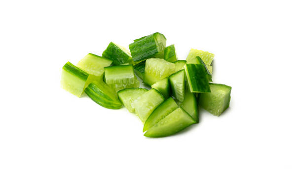 istock Fresh sliced cucumber. Close up. Isolated on white background 1269378445