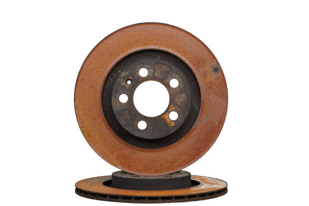 istock Old rusty brake disc from car isolated on white background 1269380105