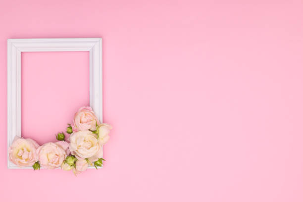 istock Wooden decorative frame on pink background 1269381373