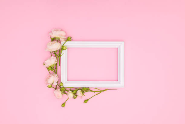 istock Wooden decorative frame on pink background 1269381403
