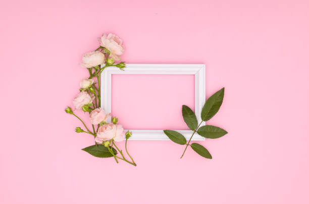 istock Wooden decorative frame on pink background 1269381417