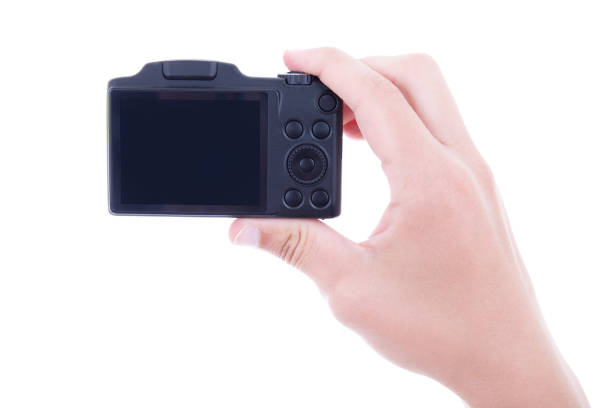 istock male hand holding compact digital camera with blank screen isolated on white 1269382985