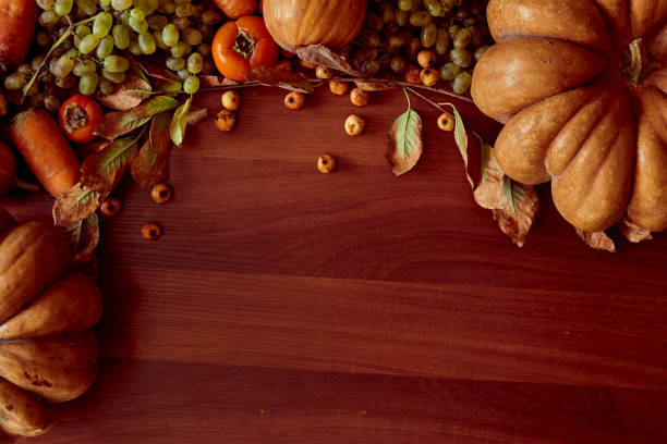 istock Autumn background with pumpkins and fruits 1269384964