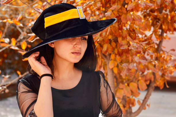 istock Woman in a witch costume 1269387216