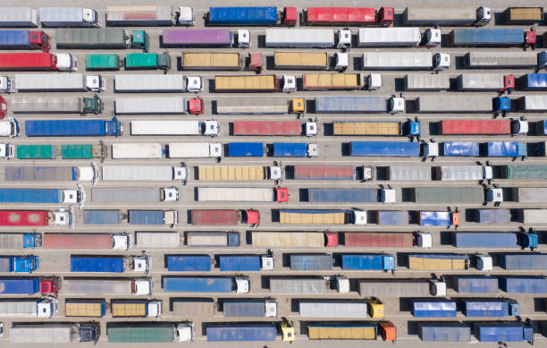 istock Trucks stand in line to the terminal. 1269388348