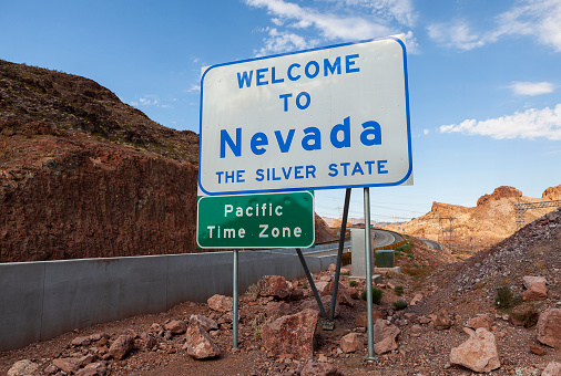 Welcome to Nevada and the Pacific Time Zone Road Sign on the Great Baisn Highway, Neveda, USA