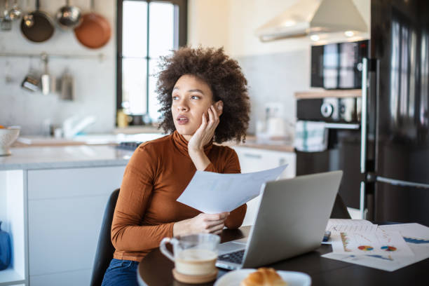 istock Beautiful young woman working from home 1269393092