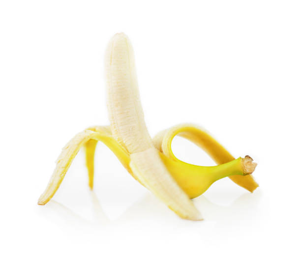 istock Peeled banana on white background 1269393817