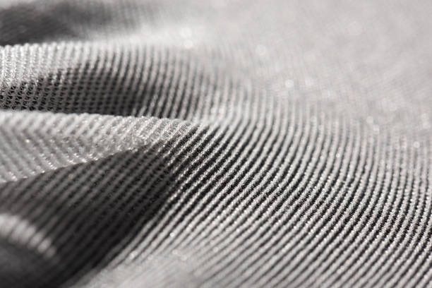 istock Texture of a fine white mesh on black background 1269394119
