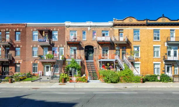 Row of 5 row houses and apartment buildings in Plateau Mont-Royal area