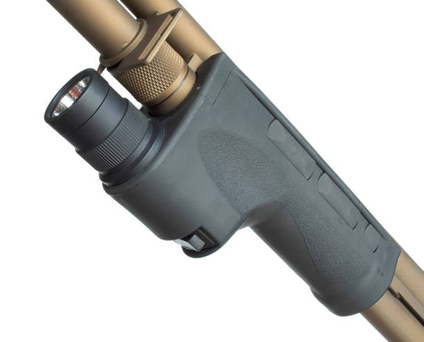 istock Weaponlight on a shotgun with a white background 1269403799