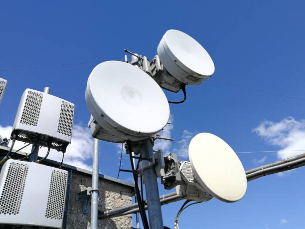 istock GSM base station antenna in front of blue cloudy sky 1269404246