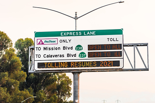 Aug 22, 2020 Fremont / CA / USA - Freeway Express Lane sign, indicating that no tolls will be charged for the rest of 2020; San Francisco Bay Area