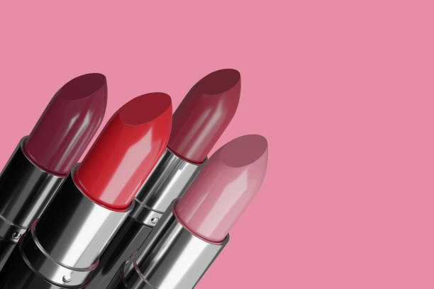 istock Four lipsticks isolated on pink background. 3d illustration. 1269409791
