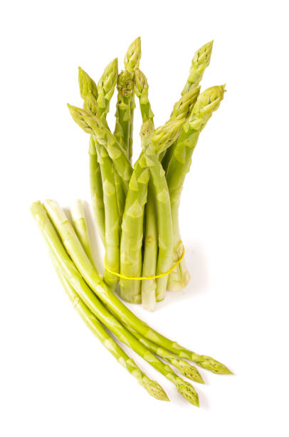 istock Fresh asparagus isolated on white background 1269410006