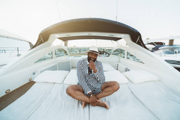 A black man on a luxury yacht