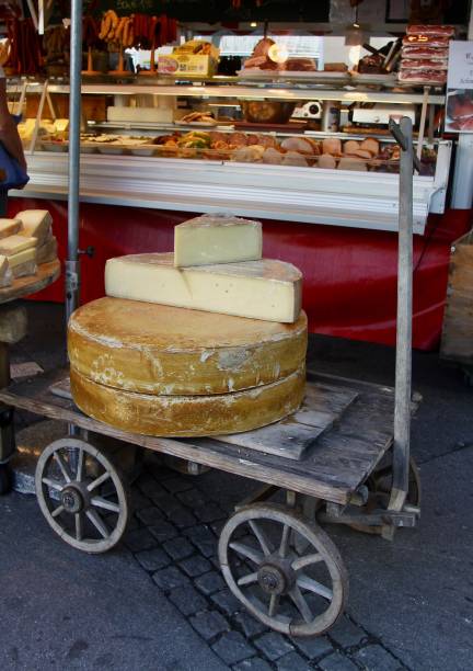 istock Cheese Wheels On A Vendors Cart 1269411676