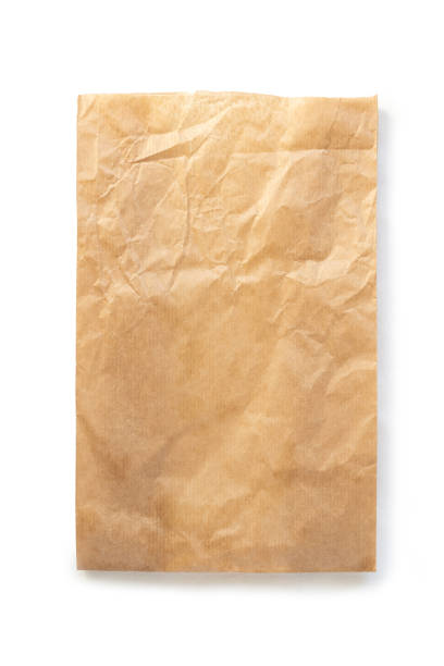 istock sheet of craft paper on white surface, isolate on white 1269414577