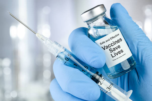 istock Drug vial with label - Vaccines Save Lives 1269417442