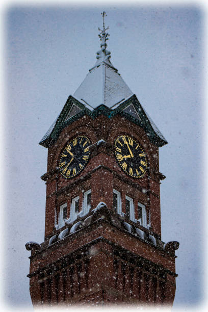 istock clock tower in snowy weather 1269422396