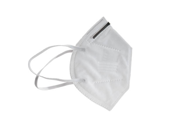 istock medical mask isolated on white background. Isolated 1269423174