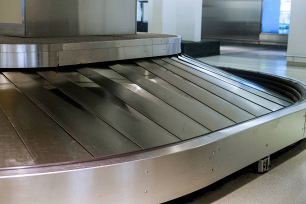 istock Empty baggage claim area at check in desk at airport 1269423347