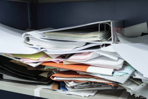 istock Messy file document and Office Supplies in filing cabinets at work office 1269440725