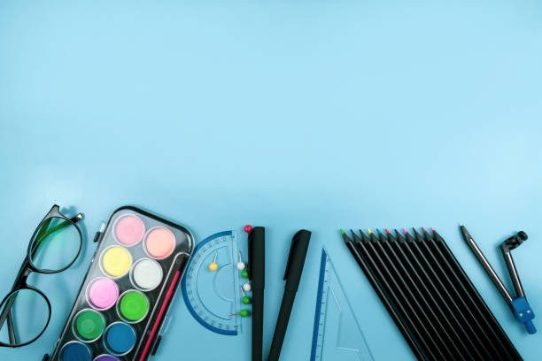 istock School supplies on blue background 1269443236