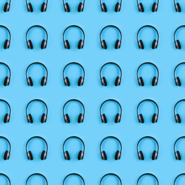 istock Wireless headphones on colorful background. 1269444582