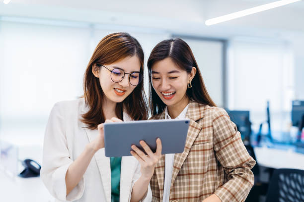 istock Two Businesswomen working together in office. 1269449449