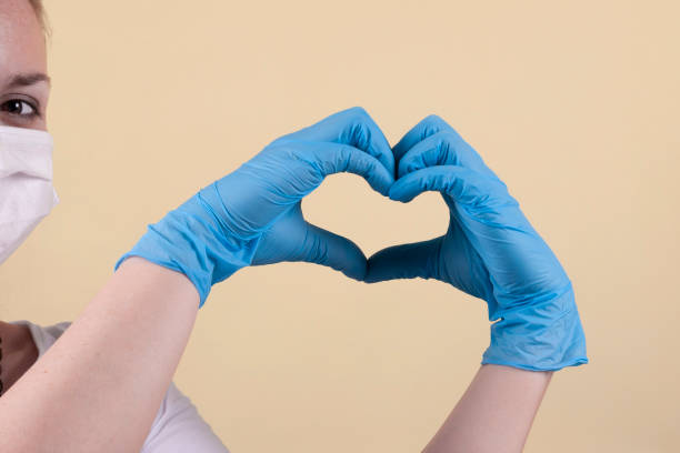 istock Medical gloves on hands 1269454046