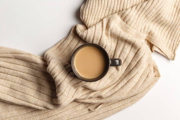 istock Abstract autumn composition. Colorful background image. Autumn, winter concept. Top view. Flat lay. Copy space. Plaid, cup of coffee on white background. Thanksgiving day concept 1269455939