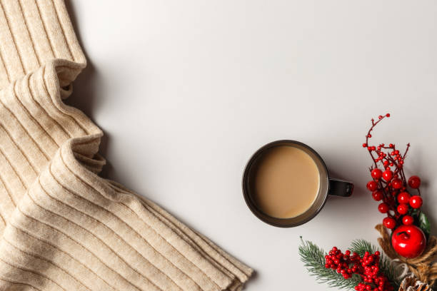 istock Abstract autumn composition. Colorful background image. Autumn, winter concept. Top view. Flat lay. Copy space. Plaid, dried leaves, cup of coffee on white background. Thanksgiving day concept 1269456086