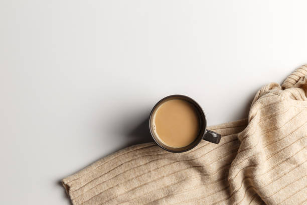 istock Abstract autumn composition. Colorful background image. Autumn, winter concept. Top view. Flat lay. Copy space. Plaid, cup of coffee on white background. Thanksgiving day concept 1269456106