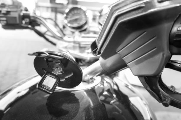 Closeup motorbike handlebars with reversing mirrors, full frame horizontal composition with copy space