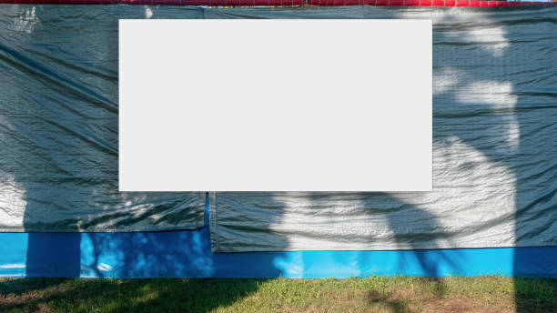 istock big white empty banner on construction site building wall with gray textile canvas 1269457135