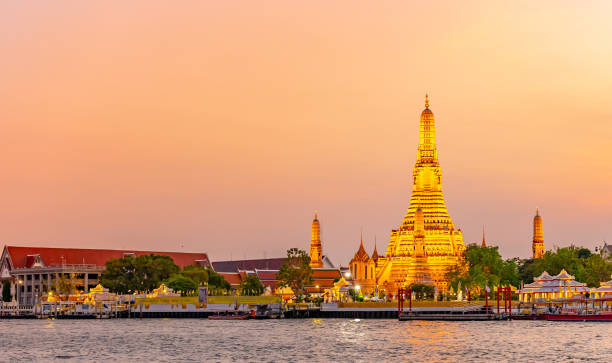 istock Wat Arun Temple at sunset in Bangkok, Thailand 1269462317