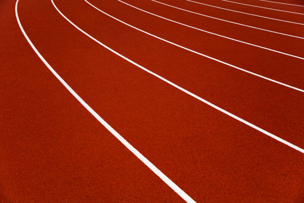istock Red stadium running tracks closeup 1269462629