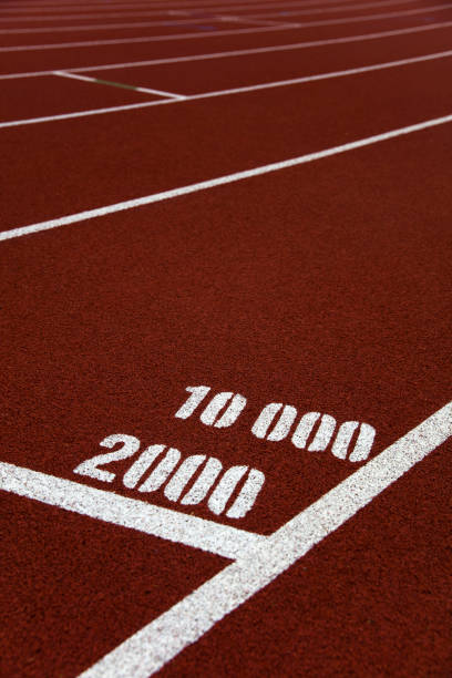 istock Red stadium running track closeup 1269462630