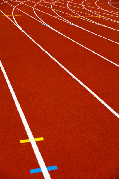 istock Red stadium running track closeup 1269462634