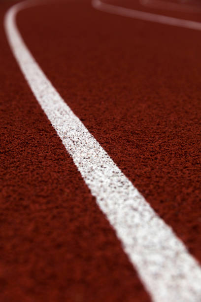 istock Red stadium running track closeup 1269464709
