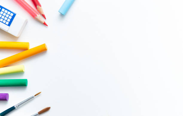 istock School supplies double side border. Top view isolated on a white background with copy space. Back to school concept. 1269464798