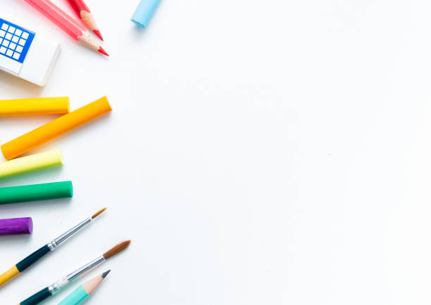 istock School supplies double side border. Top view isolated on a white background with copy space. Back to school concept. 1269464856