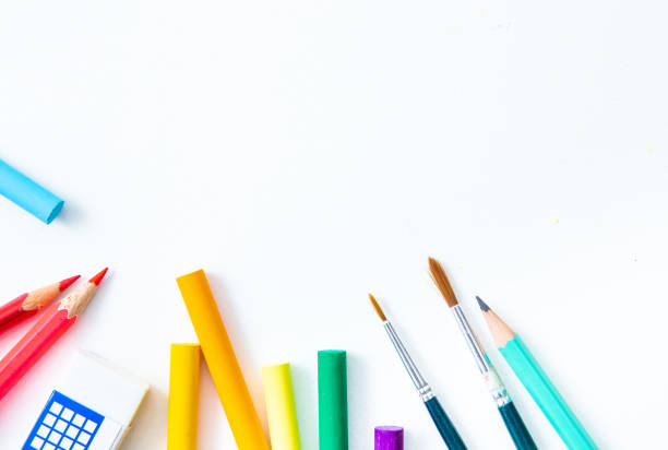 istock School supplies double side border. Top view isolated on a white background with copy space. Back to school concept. 1269464891