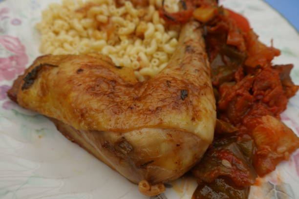istock Roasted chicken thigh served with ratatouille and pasta shells 1269464894