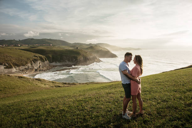 istock Young couple spending time together by the sea 1269466294