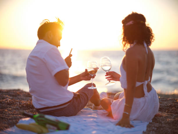 istock Young couple with sun on beach 1269479589