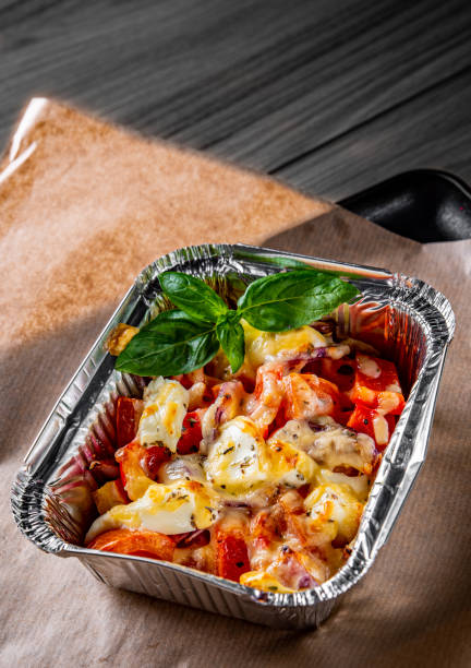 istock Baked vegetables and feta cheese in a baking dish 1269480703